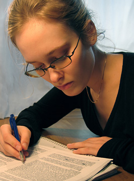 College student studying in library